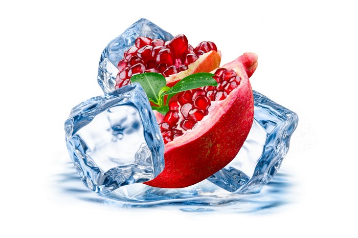 Pomegranate slice with ice cubes