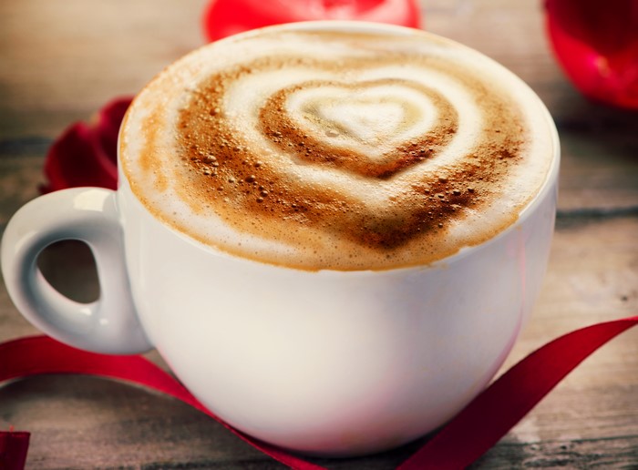 Latte art coffee cup with heart design
