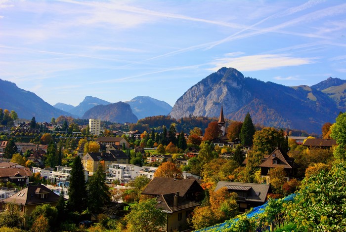 Spiez, Switzerland with Mountains and Houses in Autumn