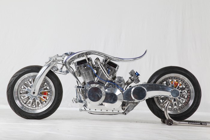 Custom motorcycle with chrome frame and V-twin engine