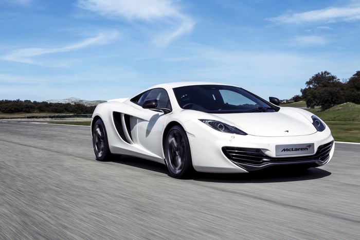 White McLaren MP4-12C on a Racetrack