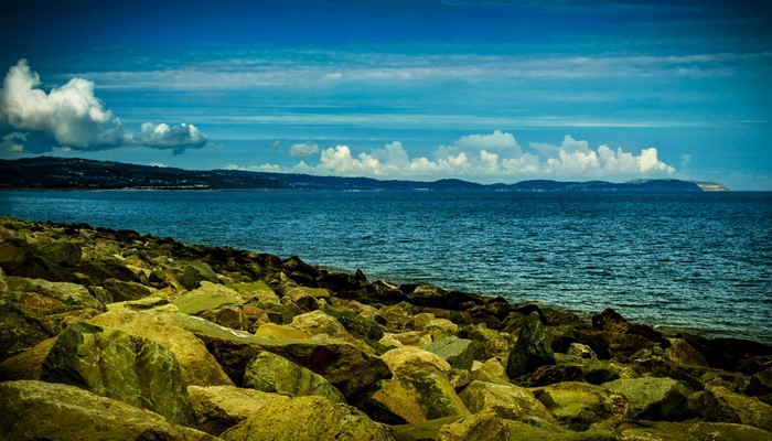 Sea and rocky coast of Colwyn Bay, Wales, UK