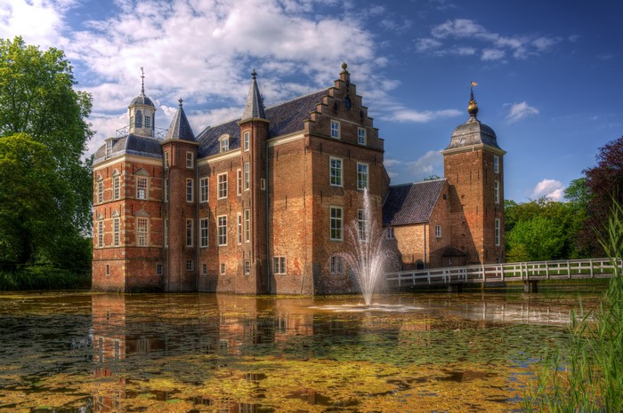 Huize Ruurlo Castle with Fountain in Pond, Netherlands