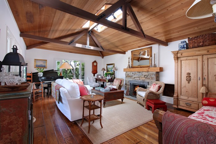 Living room with fireplace and piano