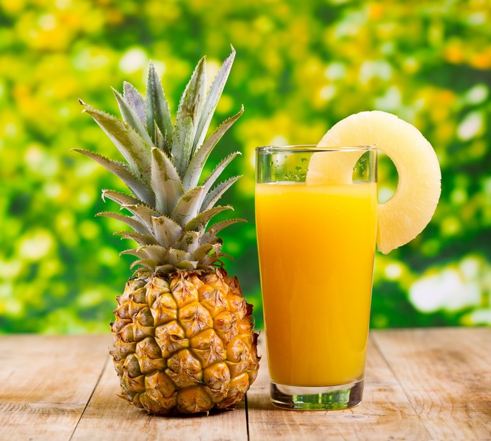 Pineapple and Pineapple Juice in Highball Glass