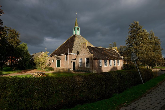 Church in Netherlands with dark clouds