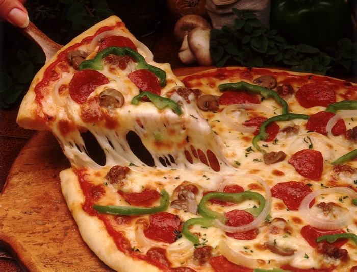 Slice of Pepperoni Pizza with Melted Cheese