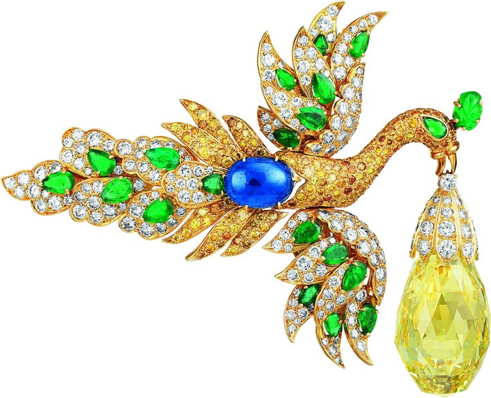 Peacock brooch with diamonds, emeralds, sapphires, and yellow gemstones
