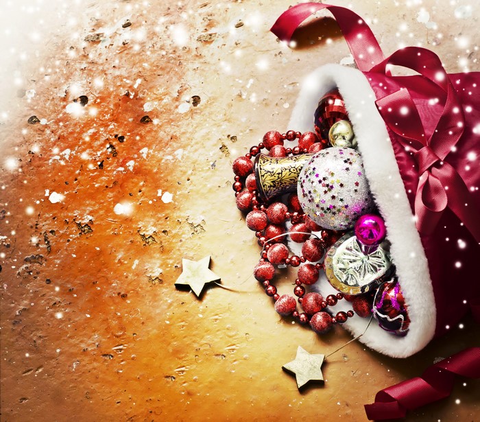 Christmas ornaments spilling from Santa's hat