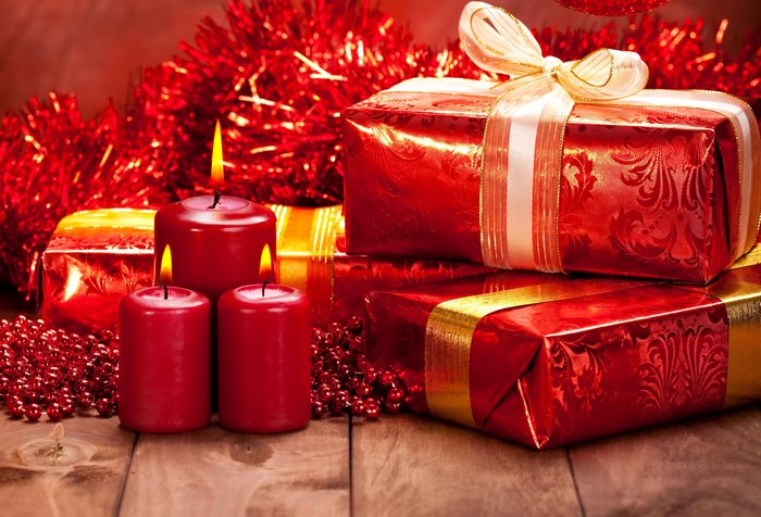 Christmas Gifts and Candles with Red Tinsel
