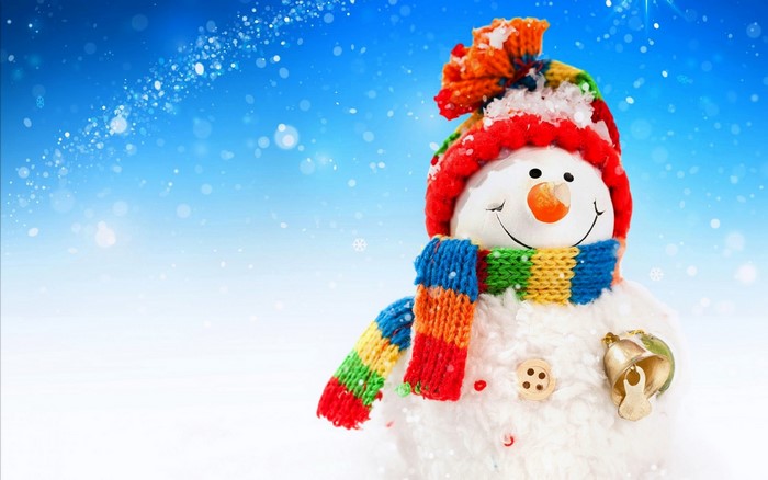 Snowman with colorful hat and scarf holding a bell