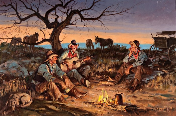 Cowboys singing around a campfire with horses and a wagon
