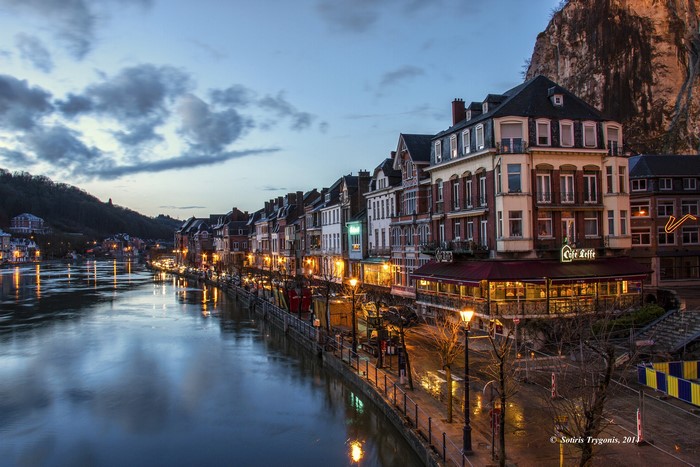 Dinant, Belgium waterfront at dusk with Cafe Leffe