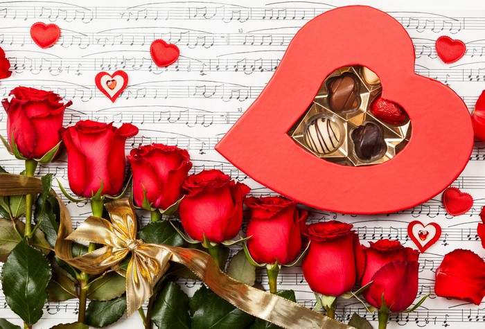 Red Roses and Chocolates on Sheet Music for Valentine's Day