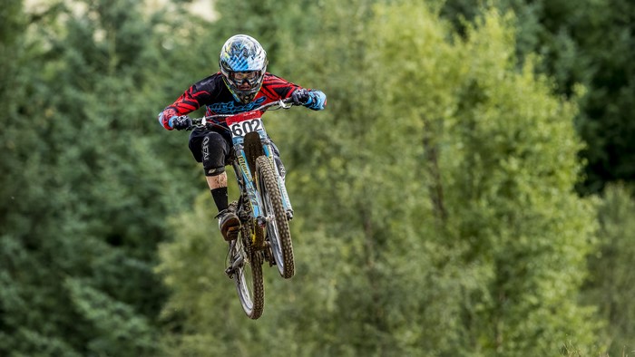 Mountain biker in mid-air jump