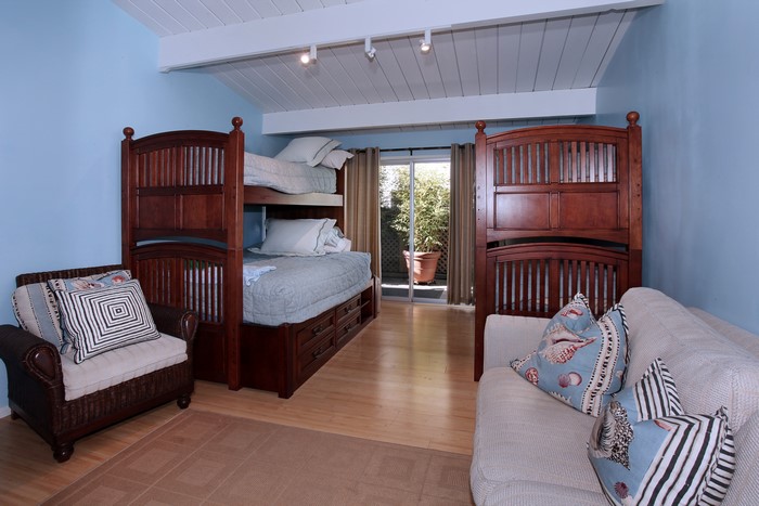 Bedroom with Bunk Beds and Sofa