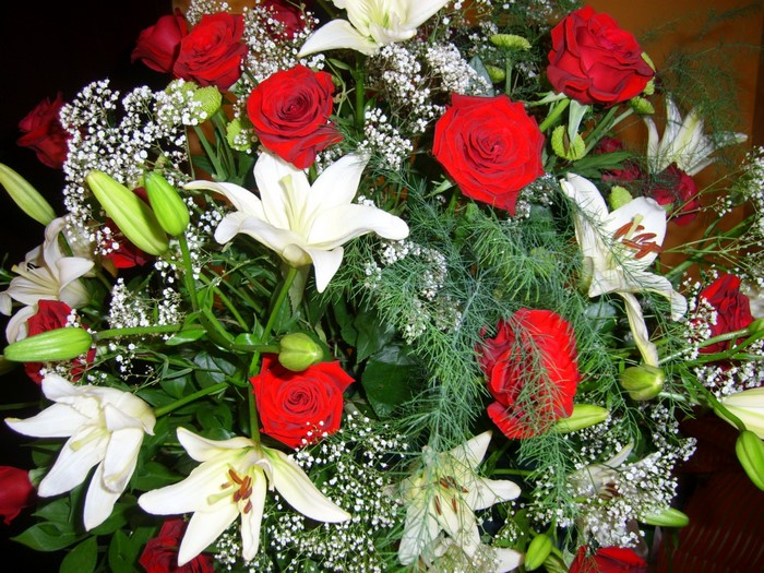 Bouquet of red roses and white lilies
