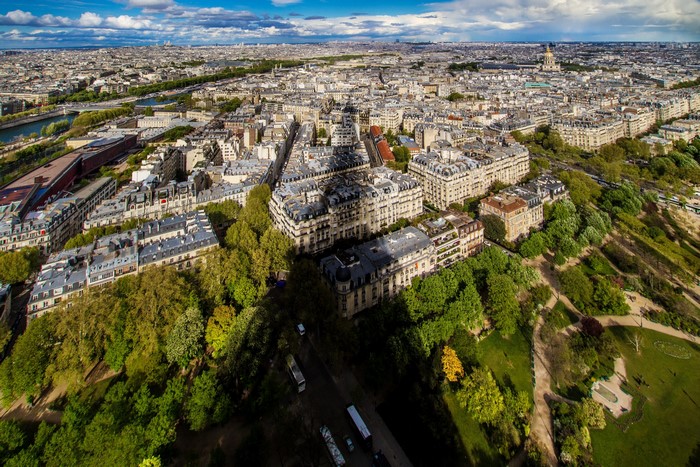 Aerial view of Paris cityscape with buildings and trees