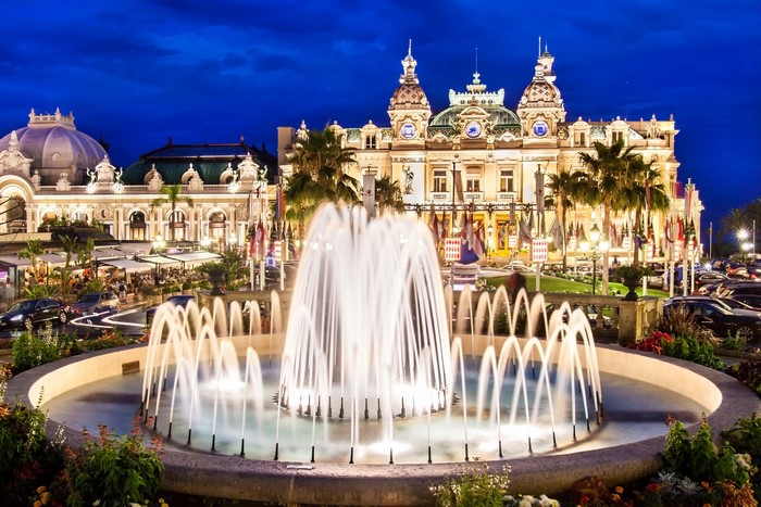 Casino de Monte-Carlo at night with fountain