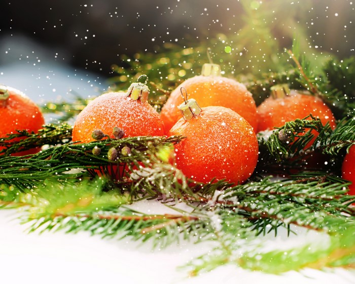 Christmas ornaments with pine branches and snow