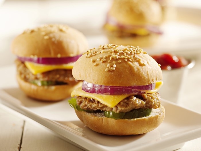 Mini hamburgers with cheese and red onion