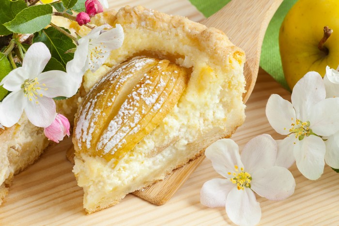 Slice of apple pastry with flowers