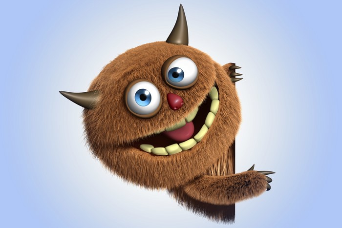 Furry monster peeking from behind a surface