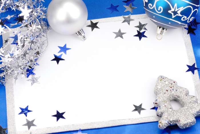 Christmas Ornaments and Stars on Blue Background