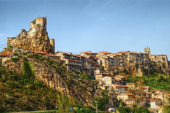 Fortress and houses on a rocky crag in Spain