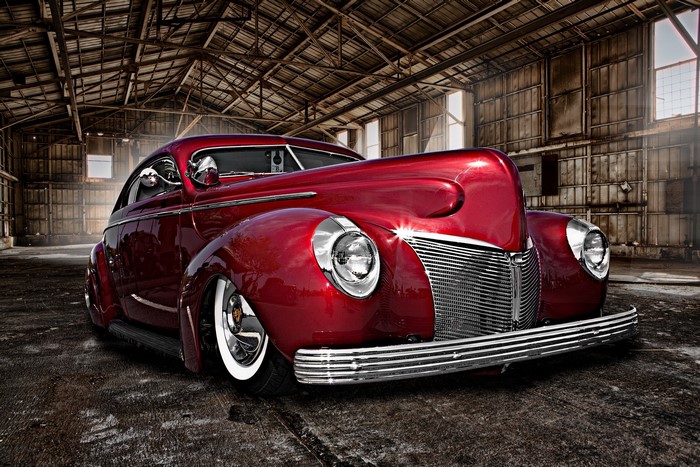 Red Ford hot rod in a warehouse