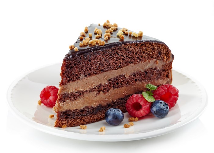 Chocolate cake slice with berries