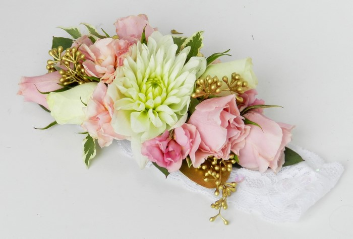 Corsage with pink roses and white dahlia