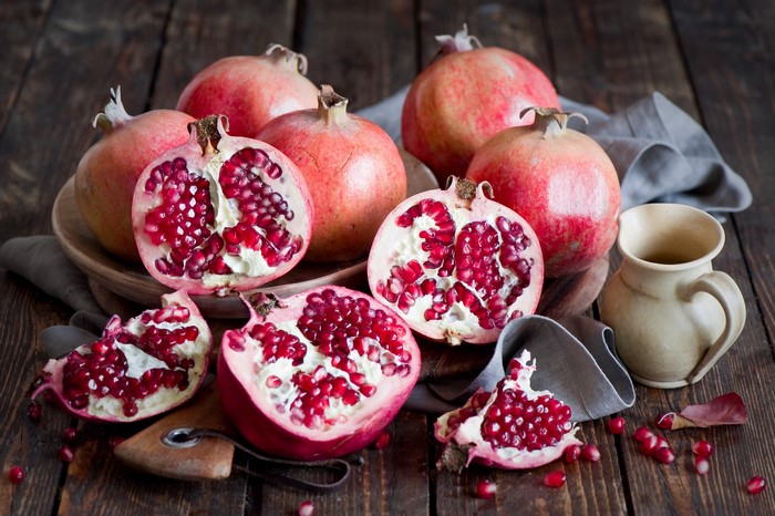 Pomegranates on a wooden table