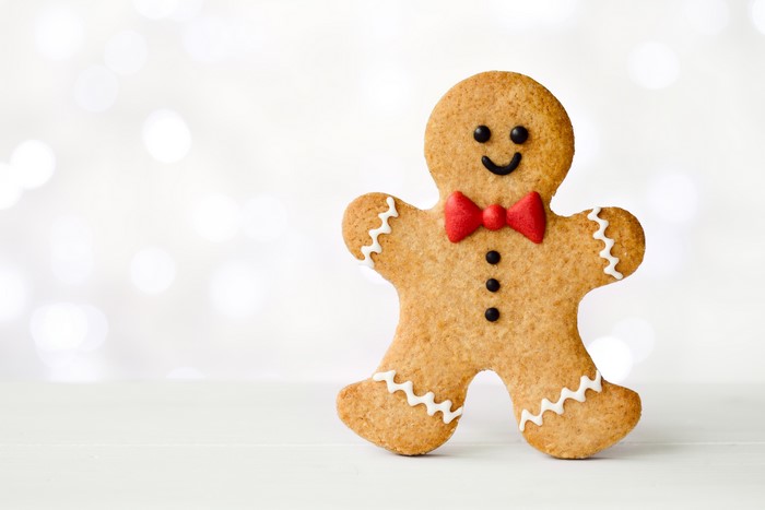 Gingerbread man cookie with red bow tie