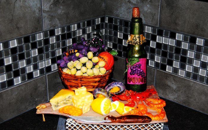 Still-life with wine bottle, cheese, fruits, and seafood