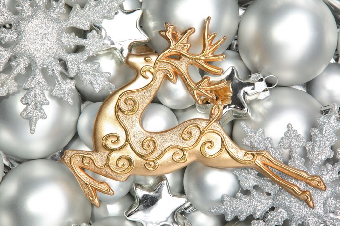 Christmas ornaments with gold deer and snowflakes