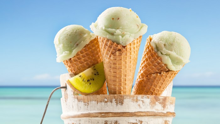 Kiwi ice cream cones on a beach