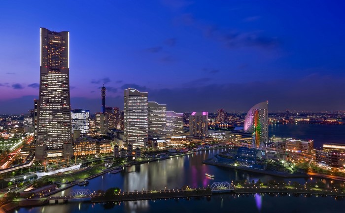 Yokohama cityscape at dusk with waterfront and bridges