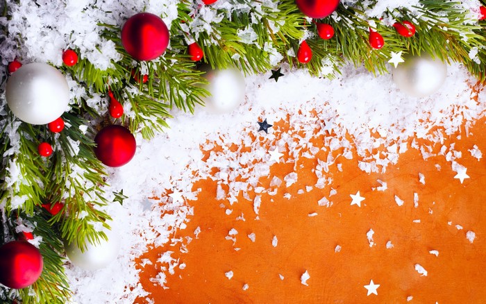 Christmas branches with ornaments and snow
