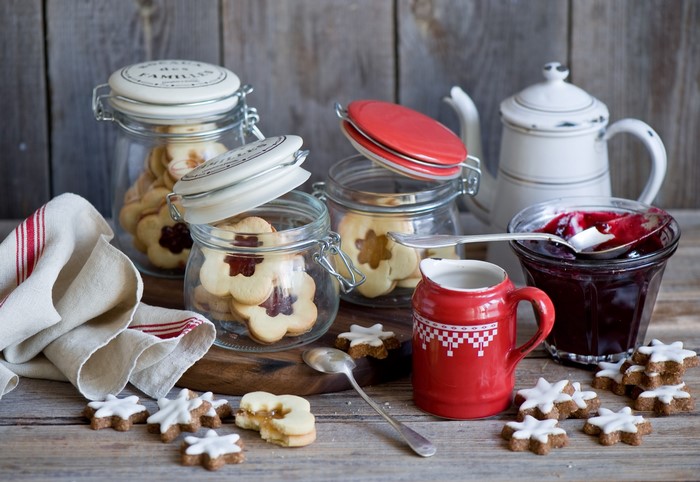 Still life of cookies, jam, and a teapot
