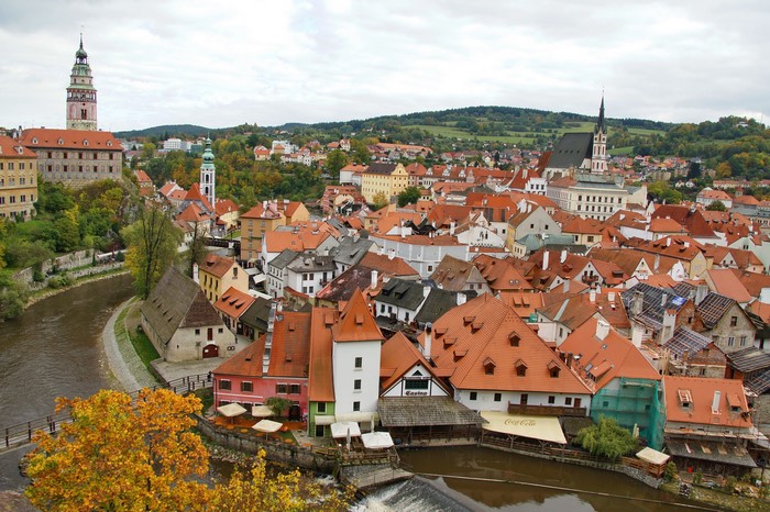 Cesky Krumlov cityscape with river and castle tower