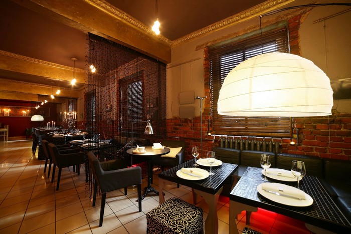Restaurant interior with tables and chairs