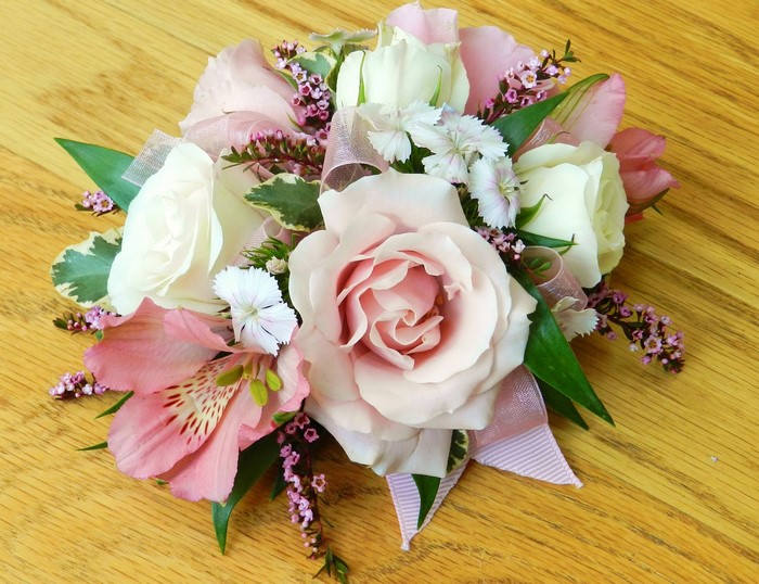 Pink and white rose and alstroemeria corsage with ribbon