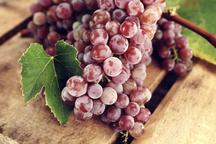 Grapes on a wooden surface