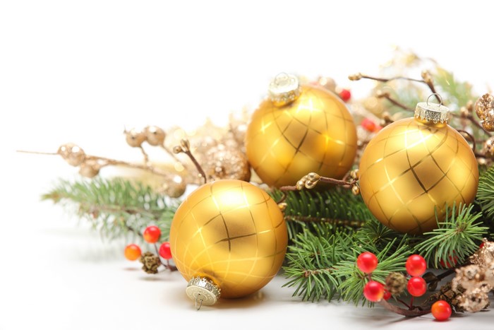 Christmas balls on branches with berries