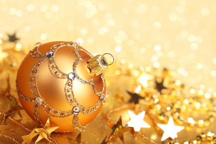 Gold Christmas Ornament with Stars and Bokeh