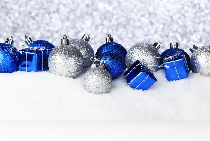 Christmas balls and gifts in snow