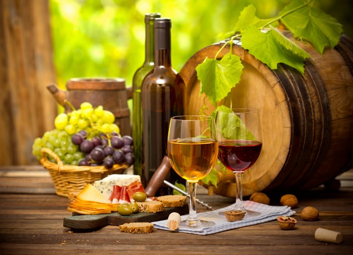 Wine, Cheese, Grapes, and Barrel