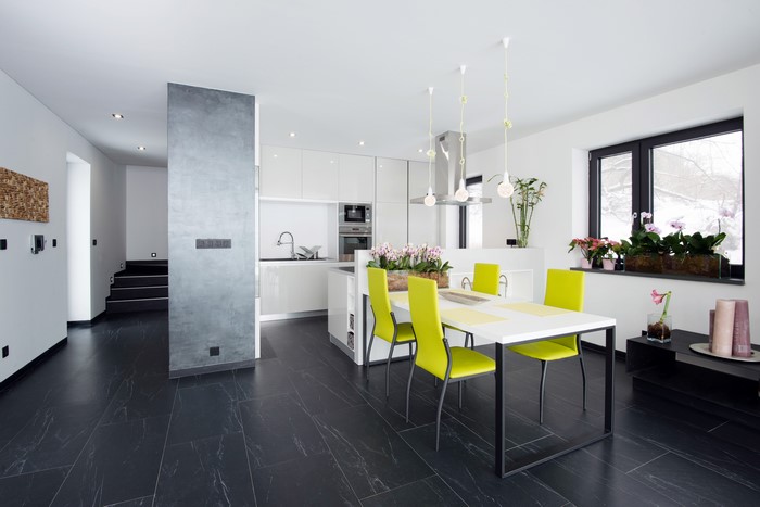 Modern Kitchen and Dining Area with Black Floor