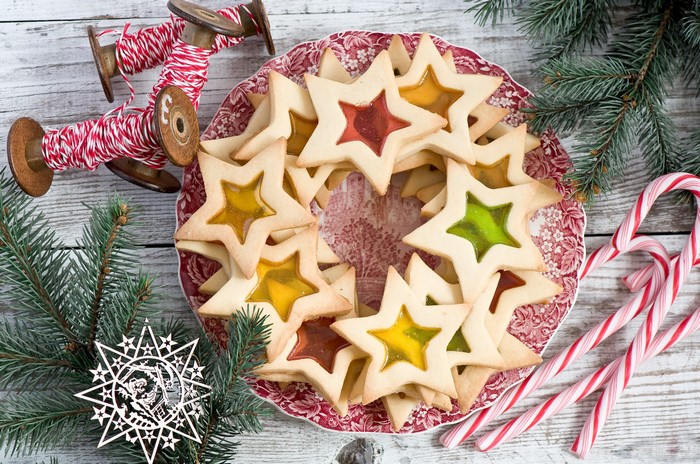 Christmas star cookies with stained glass and candy canes
